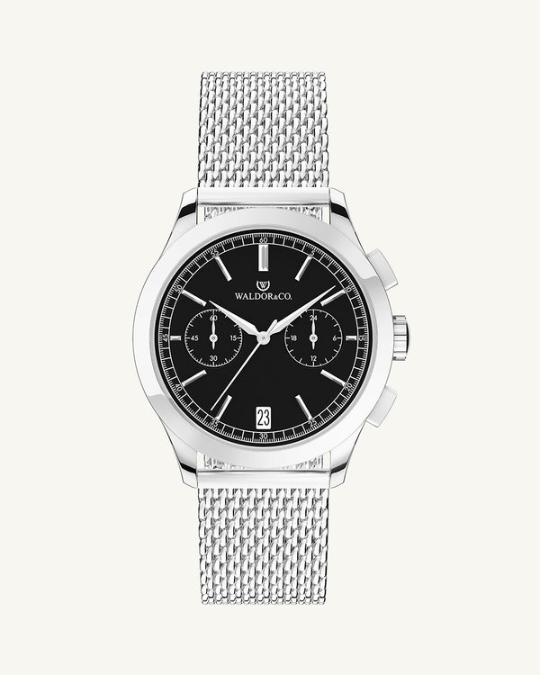 A round mens watch in rhodium-plated silver from Waldor & Co. with black sunray dial and a second hand. Seiko movement. The model is Chrono 39 Sardinia 39mm.