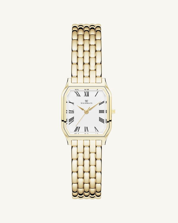 A square womens watch in 22k gold from Waldor & Co. with white Diamond Cut Sapphire Crystal glass dial. Seiko movement. The model is Eternal 22 Bellagio.