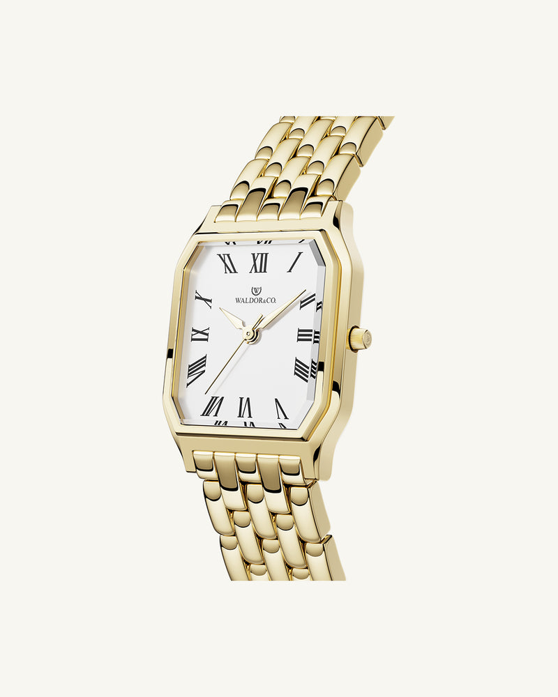 A square womens watch in 22k gold from Waldor & Co. with white Diamond Cut Sapphire Crystal glass dial. Seiko movement. The model is Eternal 22 Bellagio.