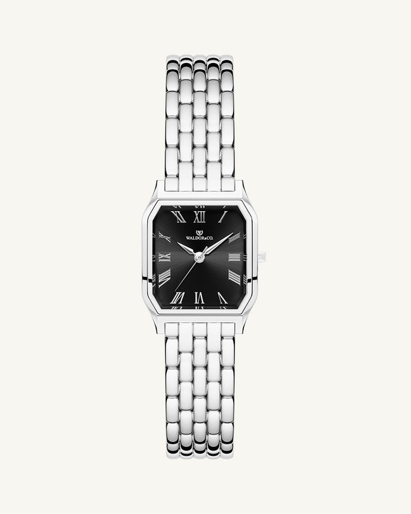 A square womens watch in Rhodium-plated 316L stainless steel from Waldor & Co. with black Diamond Cut Sapphire Crystal glass dial. Seiko movement. The model is Eternal 22 Bellagio.