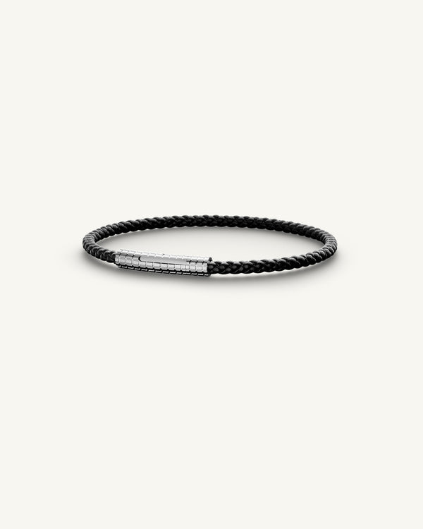 A Leather Bracelet in polished Silver plated-316L stainless steel from Waldor & Co. The model is Grid Leather Bracelet Polished.