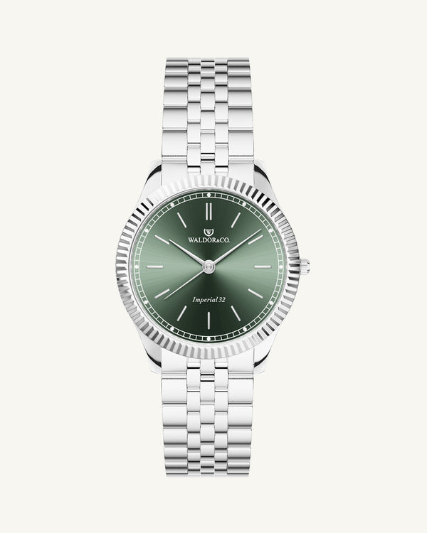 A round womens watch in silver from Waldor & Co. with green sunray dial and a second hand. Seiko movement. The model is Imperial 32 Positano 32mm.