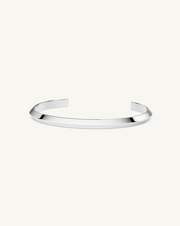 A Bangle in silver plated 316L stainless steel from Waldor & Co. One size. The model is Triangle Bangle Polished.