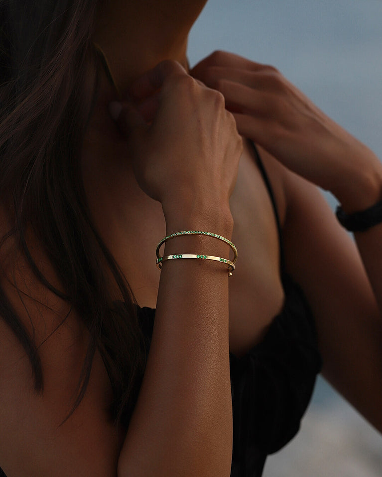 A Bangle in Rhodium-plated 316L stainless steel from Waldor & Co. One size. The model is Dulcet Bangle Polished.