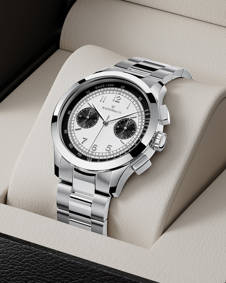 A round mens watch in rhodium-plated silver from Waldor & Co. with black and white sunray dial and a second hand. Seiko movement. The model is Chrono 39 Panda Ltd. Edition