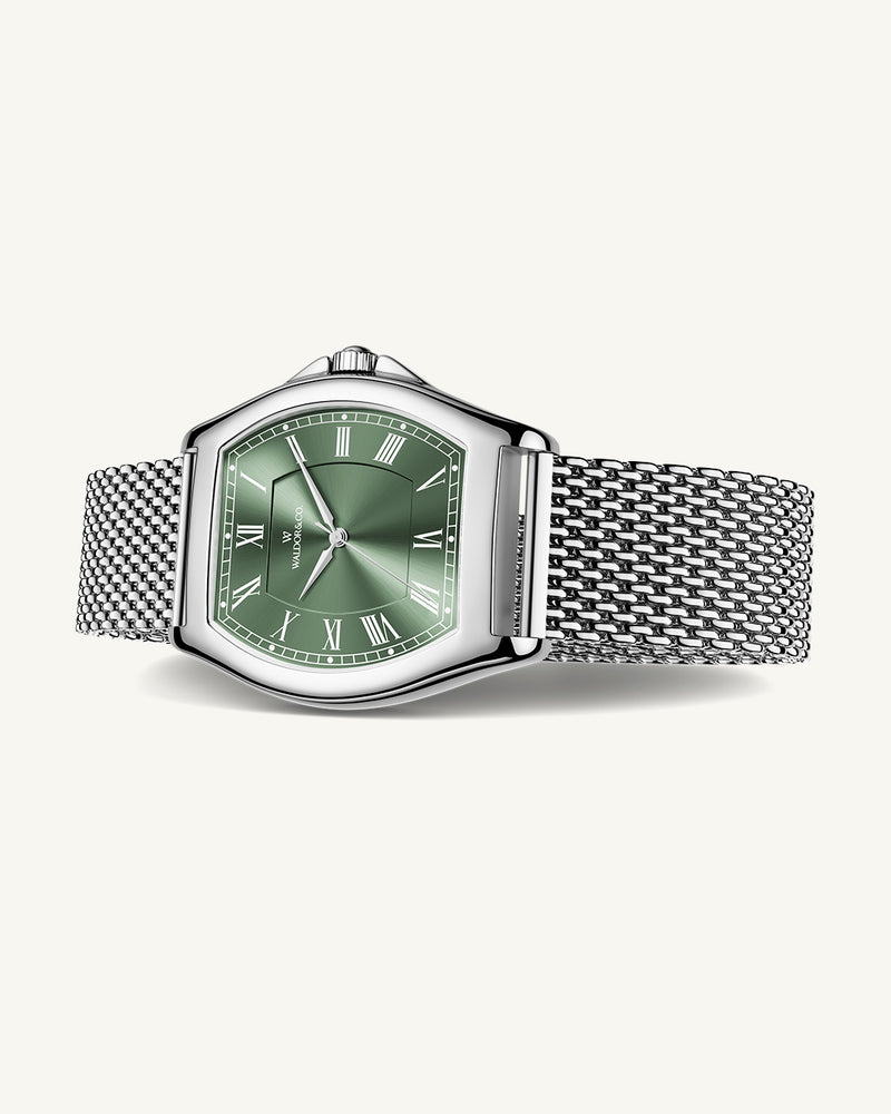 A tonneau mens watch in rhodium-plated silver from Waldor & Co. with green sunray dial and a second hand. Ronda movement. The model is Constant 40 Lecco.