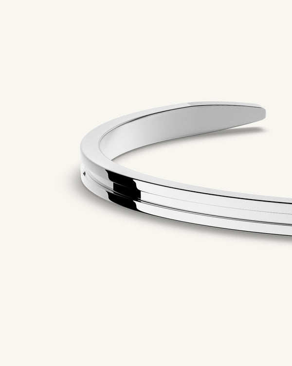 A Square Bangle in 925 Sterling Silver from Waldor & Co. The model is Demure Bangle Sterling Silver.