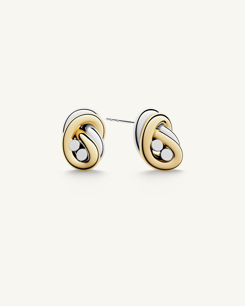 A polished stainless steel earrings in 14k gold from Waldor & Co. One size. The model is Dual Knot Ring.