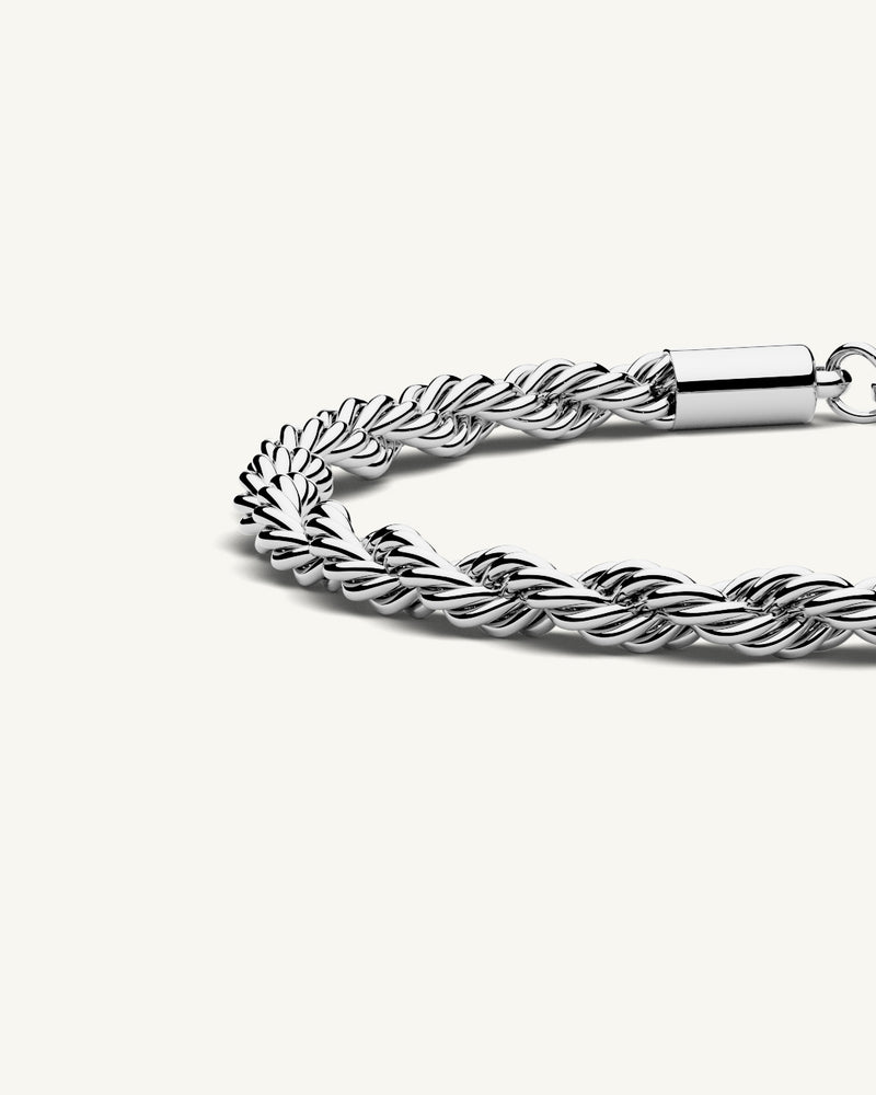 A Chain Bracelet in Silver Polished Stainless Steel from Waldor & Co. The model is Olmo Chain Polished Silver