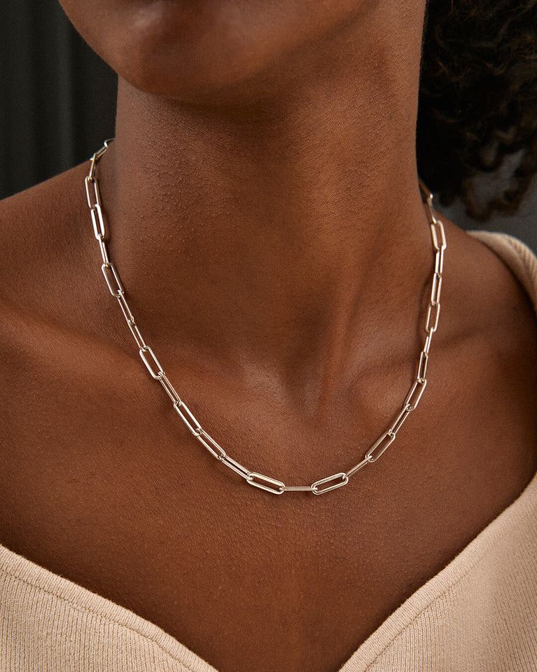 A Chain Necklace in polished Silver plated-316L stainless steel from Waldor & Co. The model is Mirihi Chain Polished